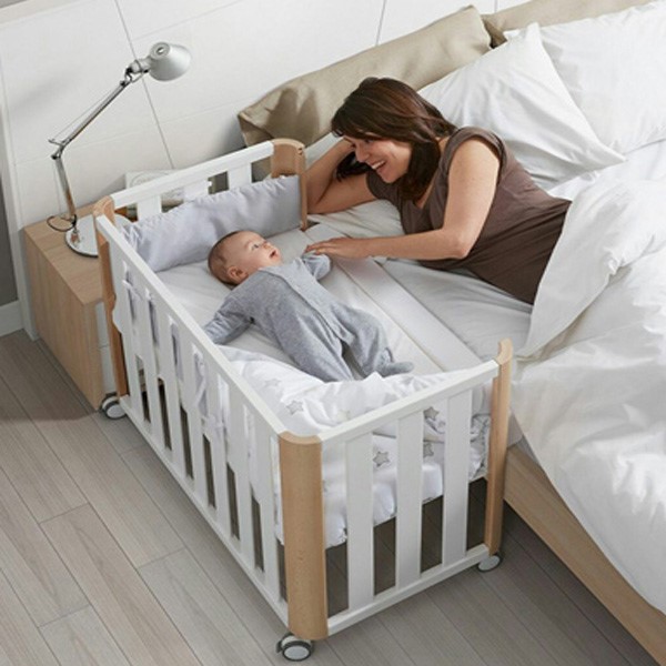 نمونه یک تختخواب نوزاد که قابلیت اتصال به تخت خواب مادر را دارد